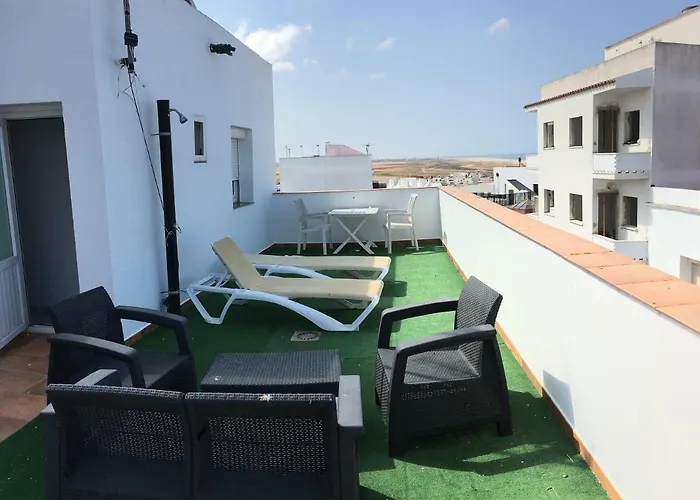 Arco - Virgen Apartamentos y Habitación